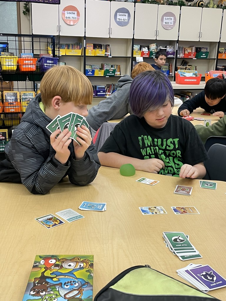 students playing card games. 