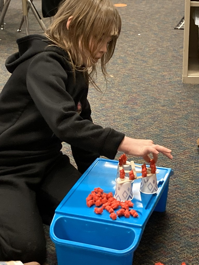 2nd graders building her "floor is lava" stem project