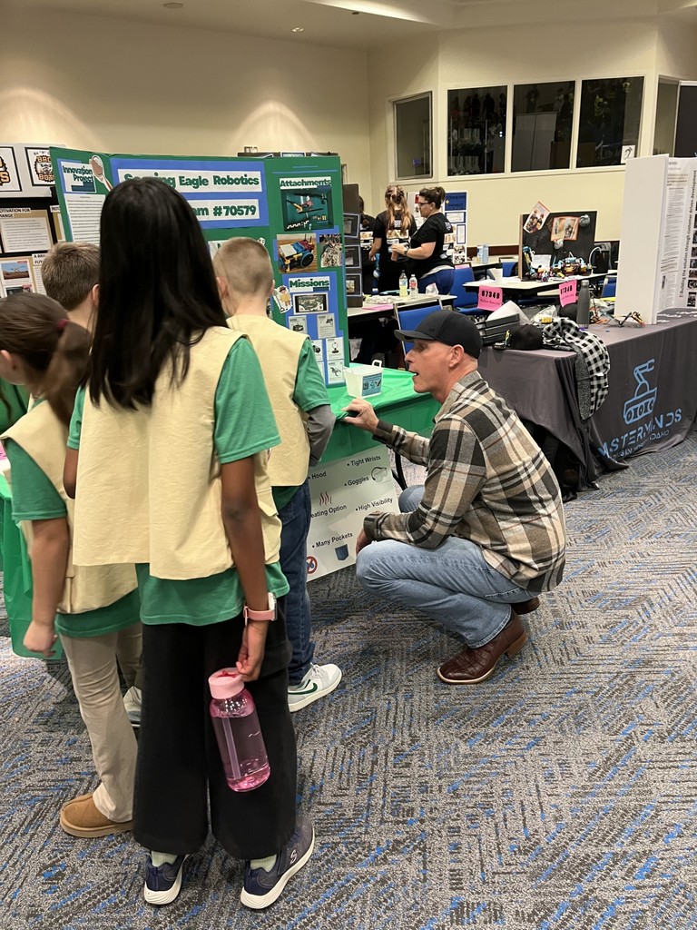 Dr Bub learns from the robotics team's booth