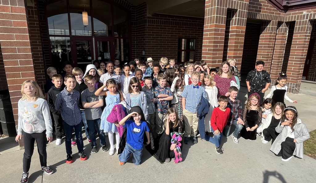 kids in front of a school