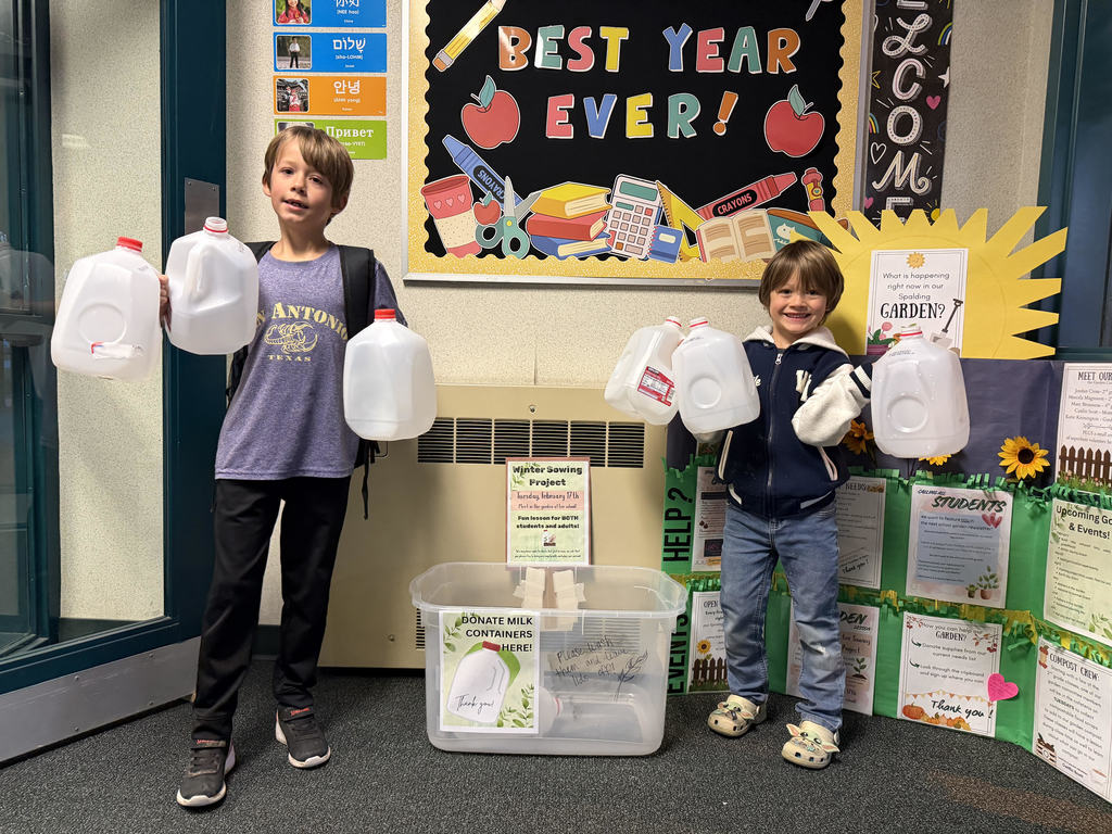 picture of Spalding students with empty milk jugs