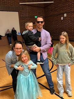 family in a gymnasium
