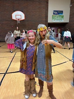 woman and girl in a gymnasium