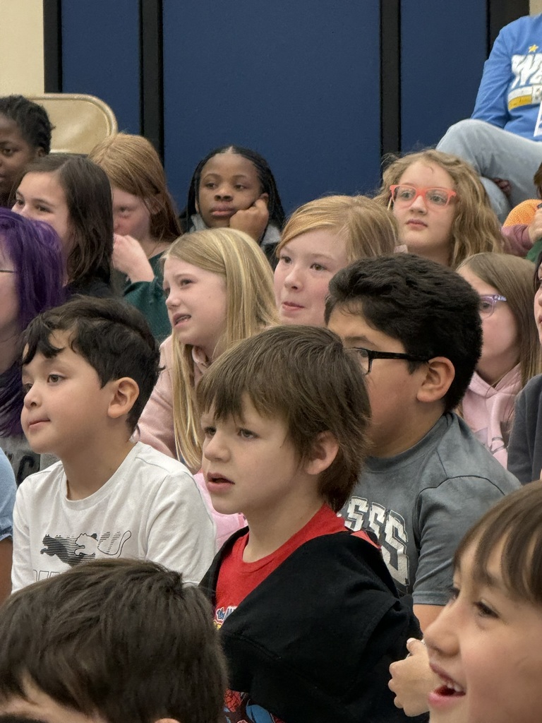 Students watching "Keeper of the Woods"