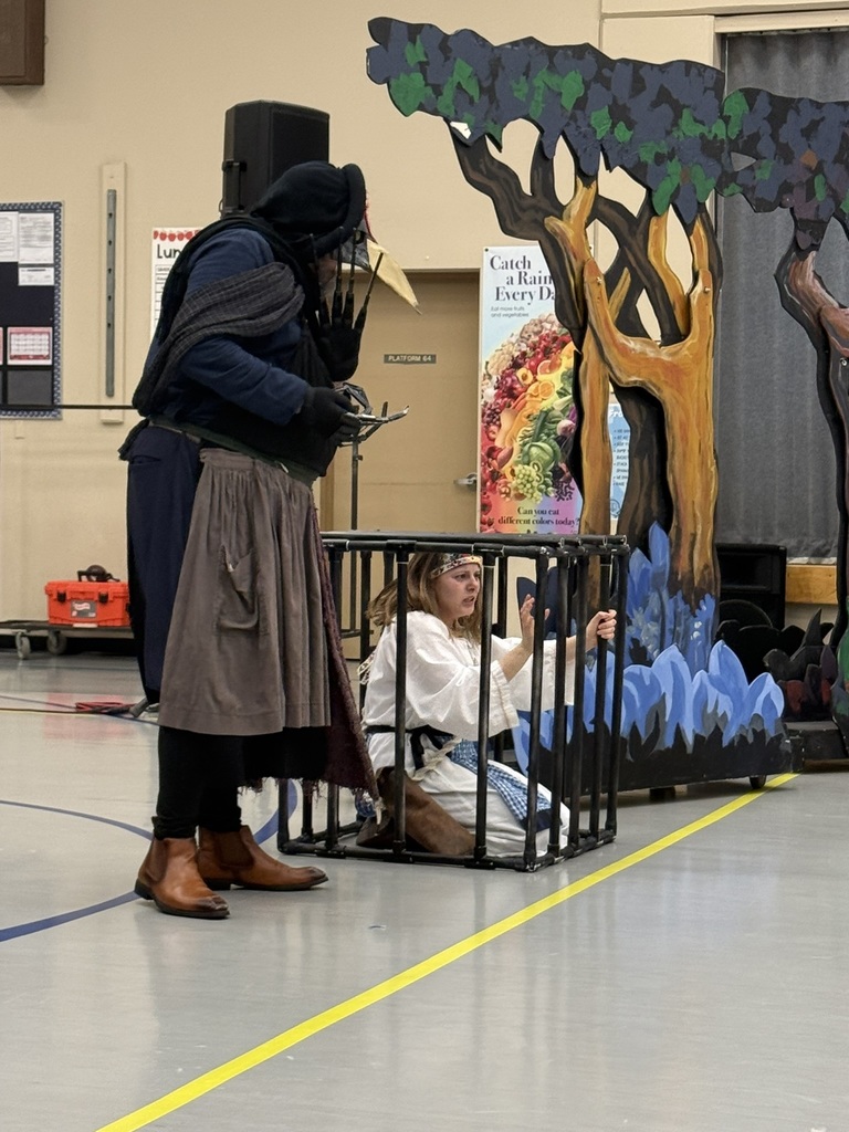 cast performing during play