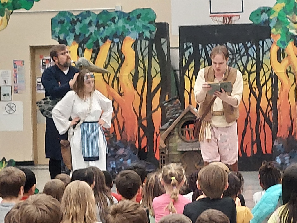 cast performing during play