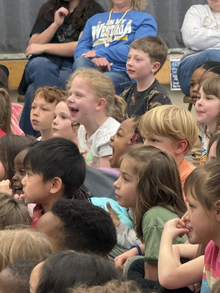 Students watching "Keeper of the Woods"