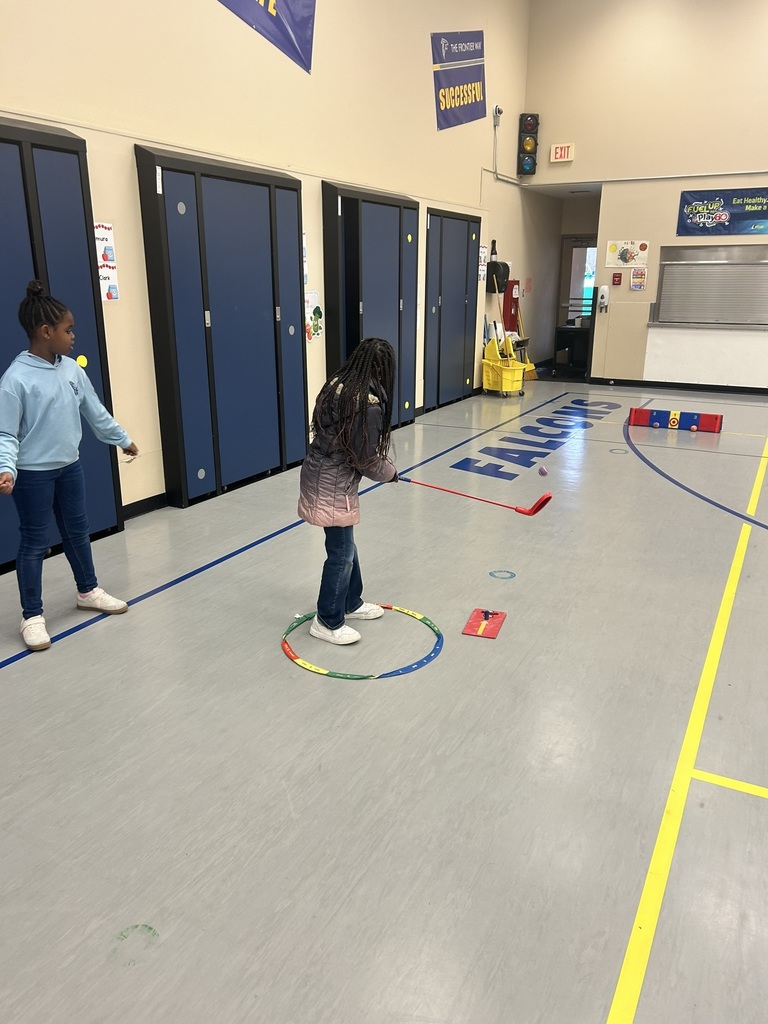 Students working on golf fundamentals