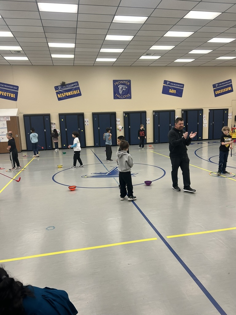 Students working on golf fundamentals