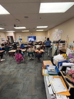 students working in a classroom 