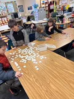 students working on desktops.