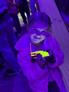 kid with glow in the dark legos