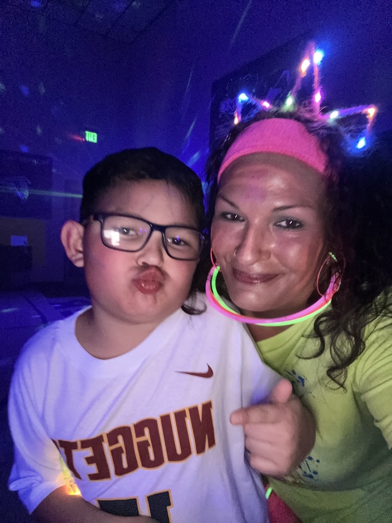 Miss Nicki and a student at the Neon Dance