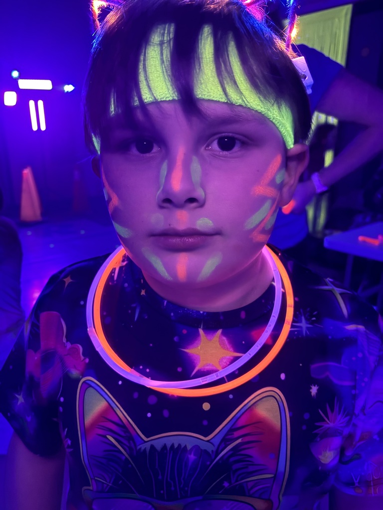 a kiddo enjoying the Neon Dance