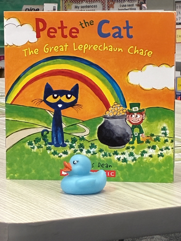 Pete the cat The great leprechaun chase blue duck in front of a book