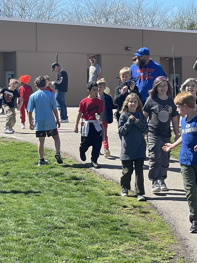 Students running and walking during the Jog-a-Thon.