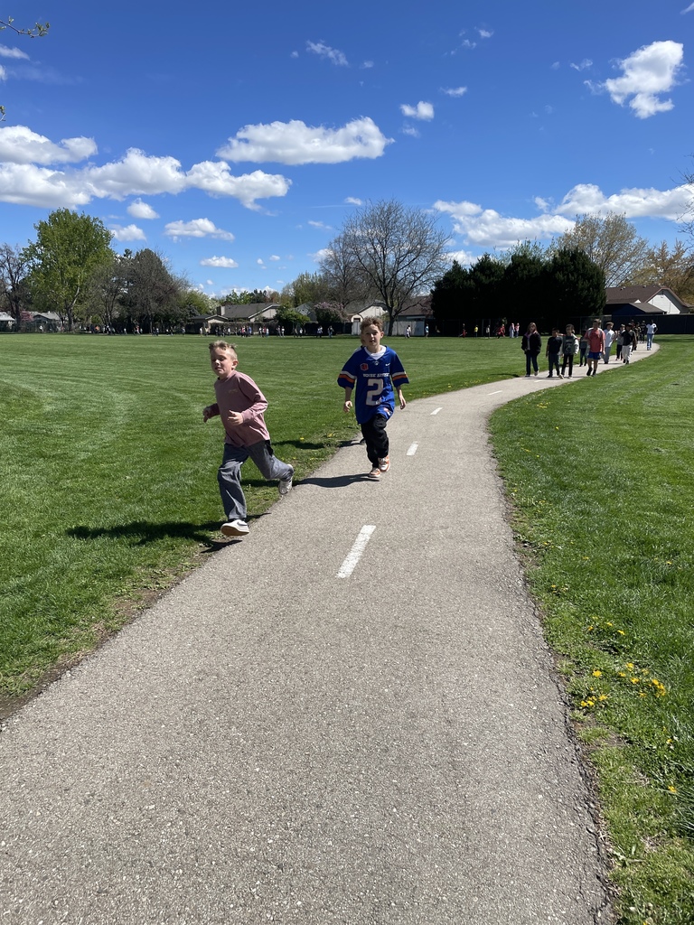 Students running and walking during the Jog-a-Thon.