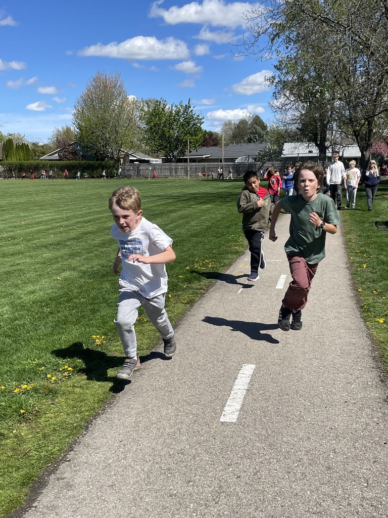 Students running and walking during the Jog-a-Thon.