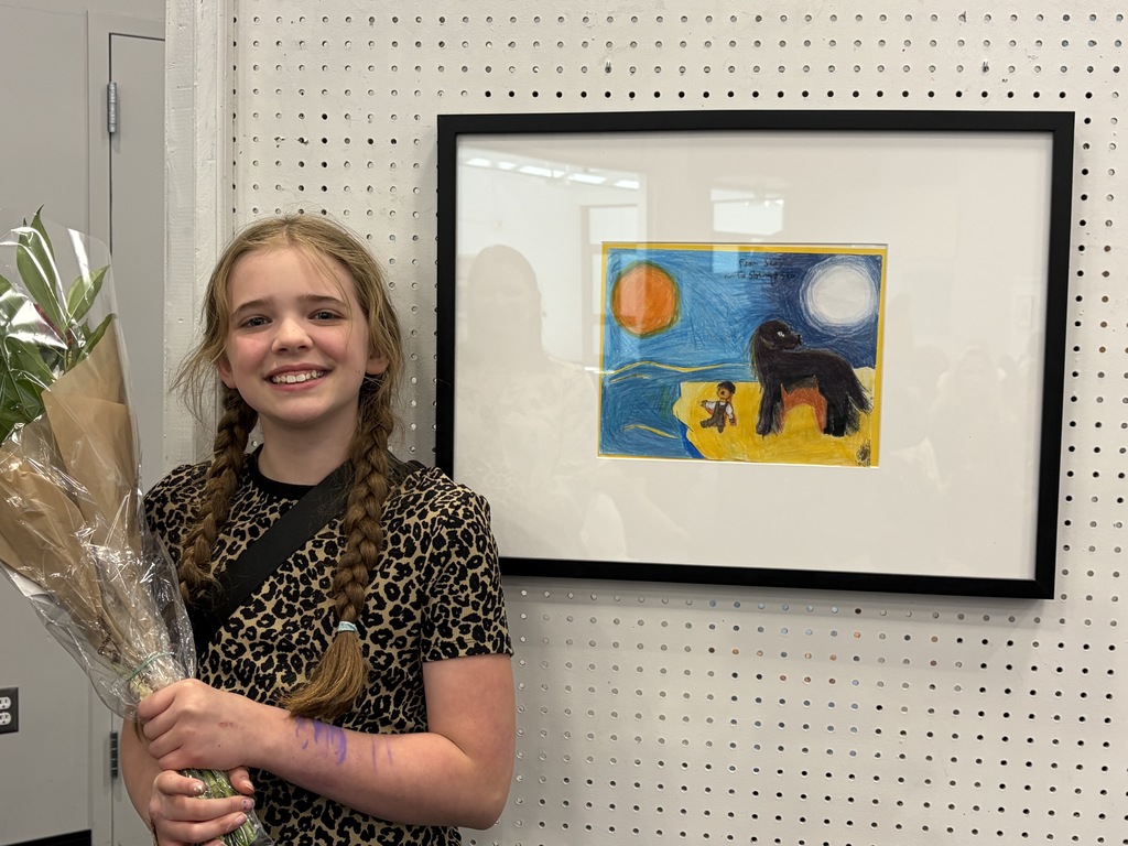 child with framed art