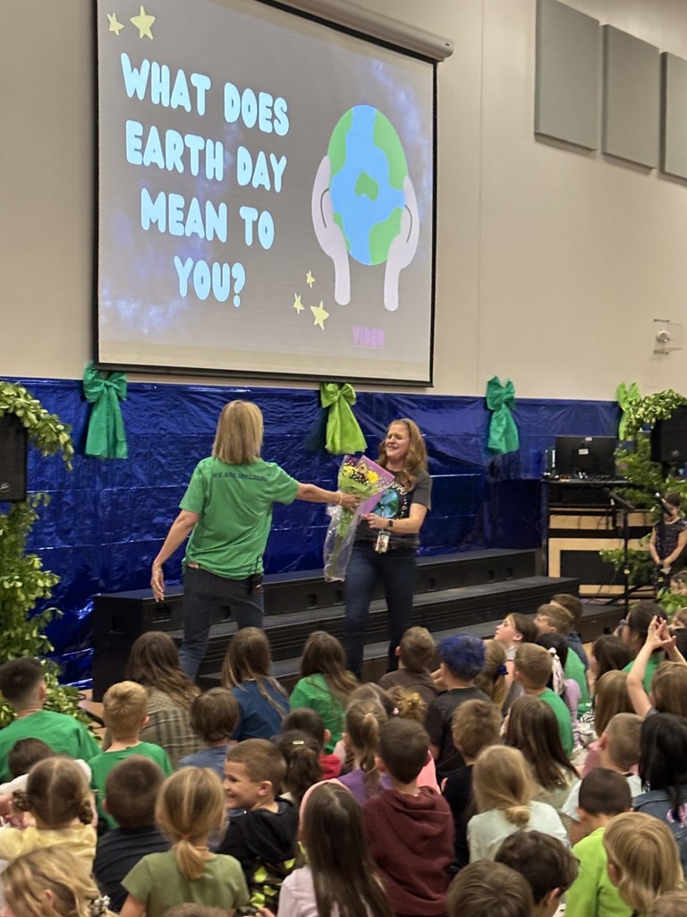 Hampton gives Mrs Coombs flower bouquet