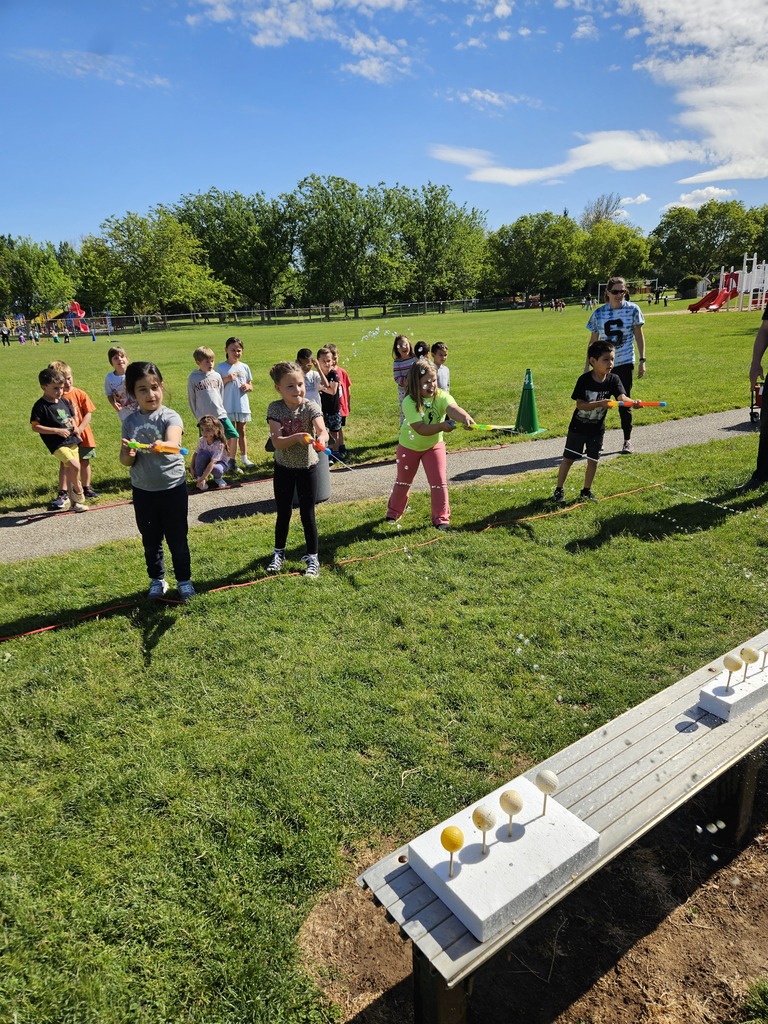Field Day photos Summerwind STEM Academy- Students shooting water
