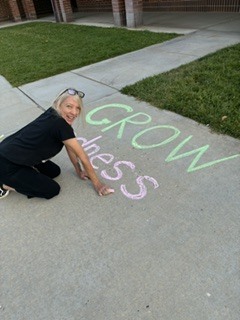 woman drawing with chalk