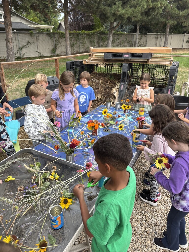 students at the flower table