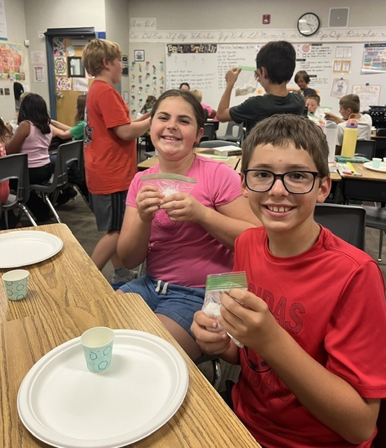 5th graders are making slime.