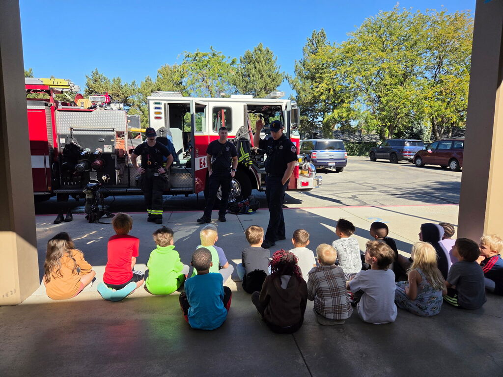 Boise Firemen talking to first graders about fire safety. 