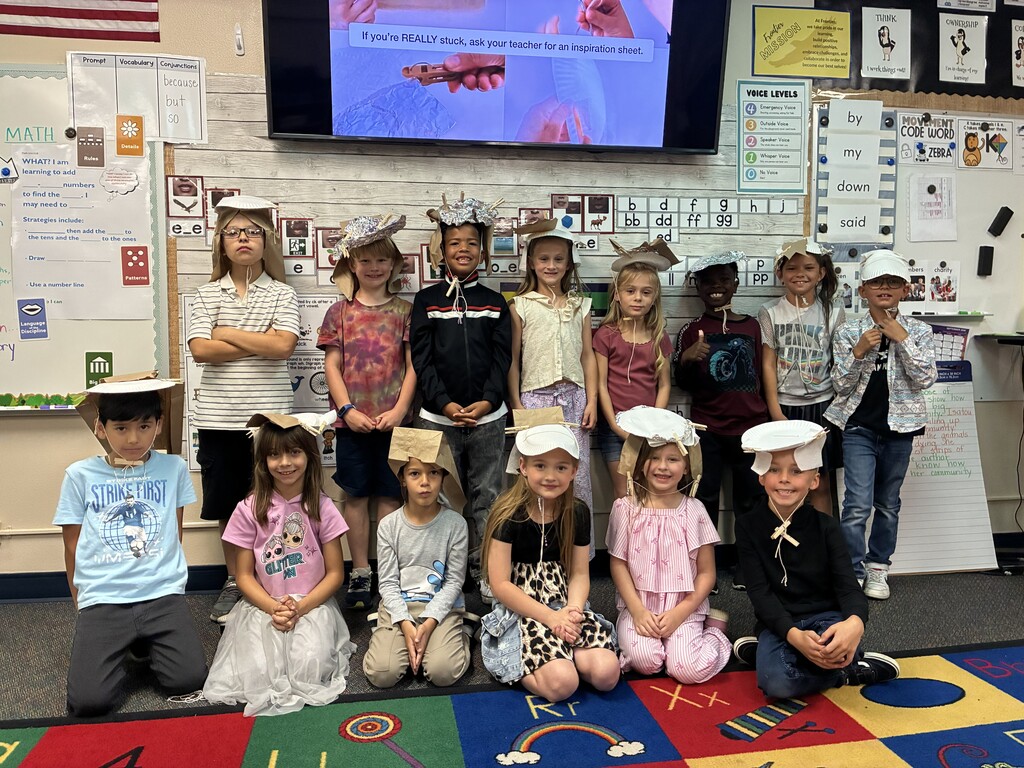 Mrs. Stewart's class wearing the hats they made.