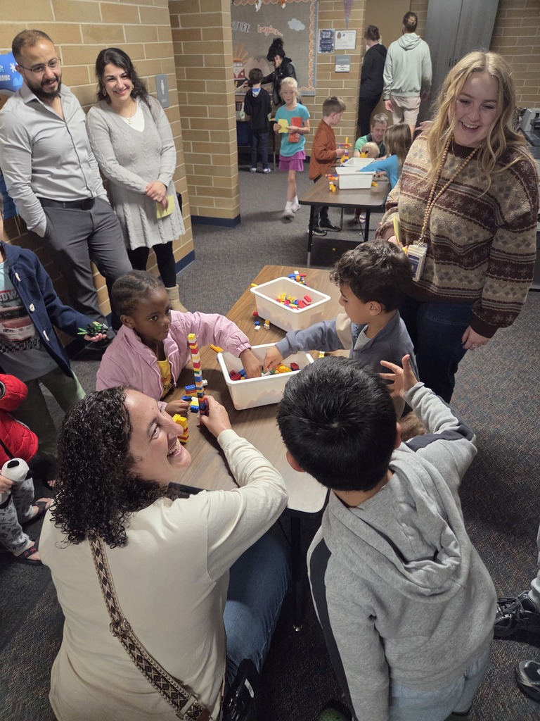 students building with Lego