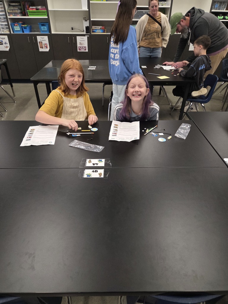 Girls building Bristlebots