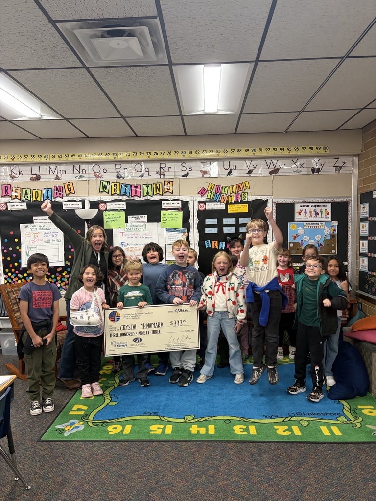  Teacher with students and Grant check