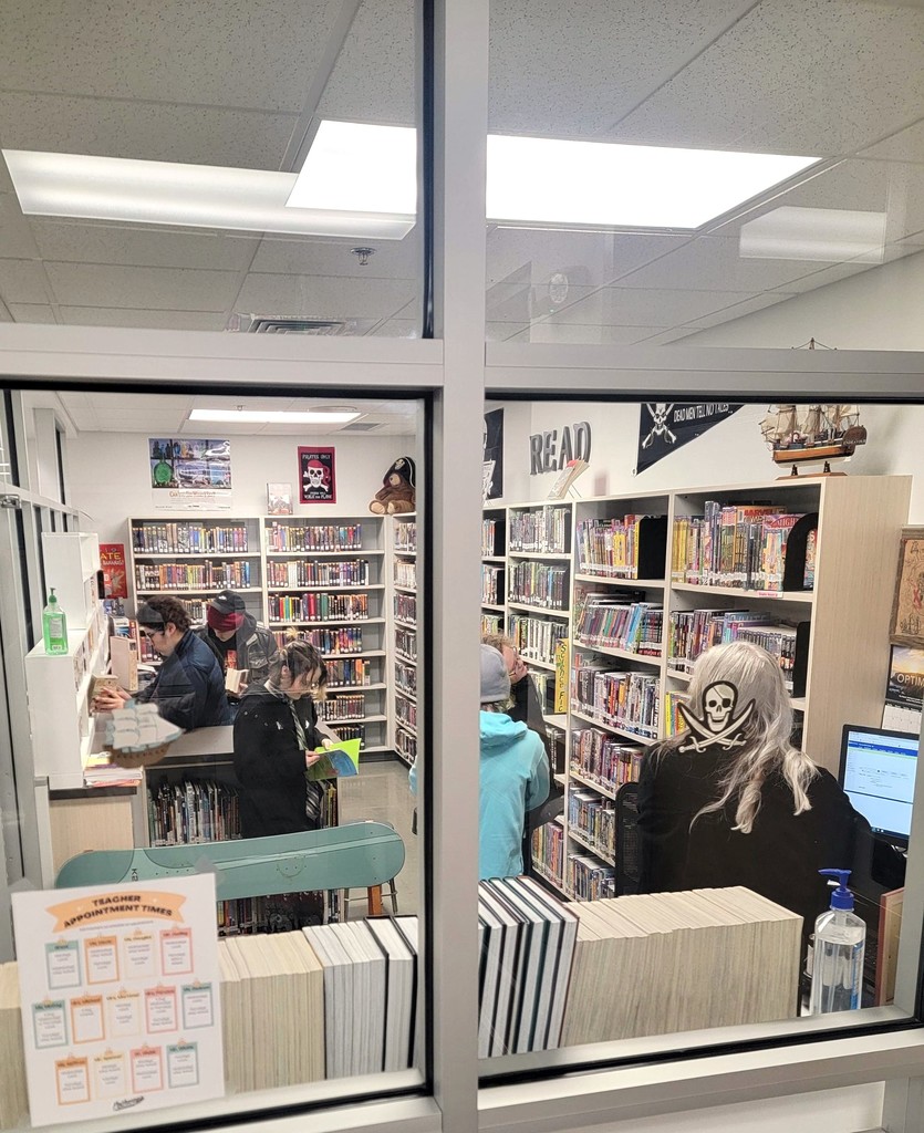 We are so thankful for our librarian and library volunteers! Our students love checking out books.