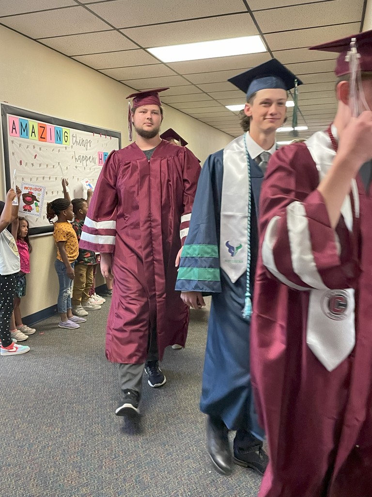 Grads walking the hallway