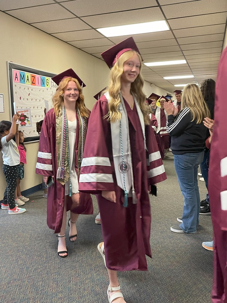 Grads walking the hallway