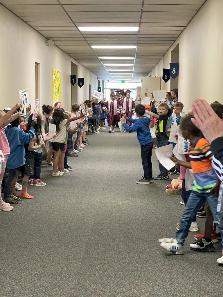Grads walking the hallway