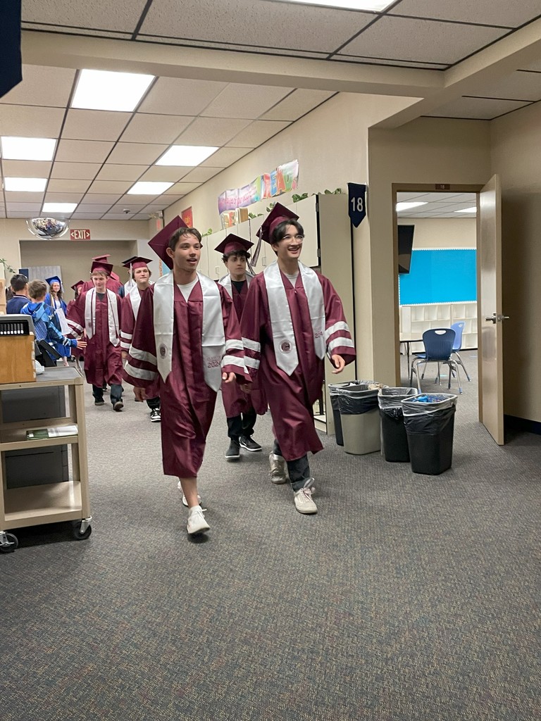 Grads walking the hallway