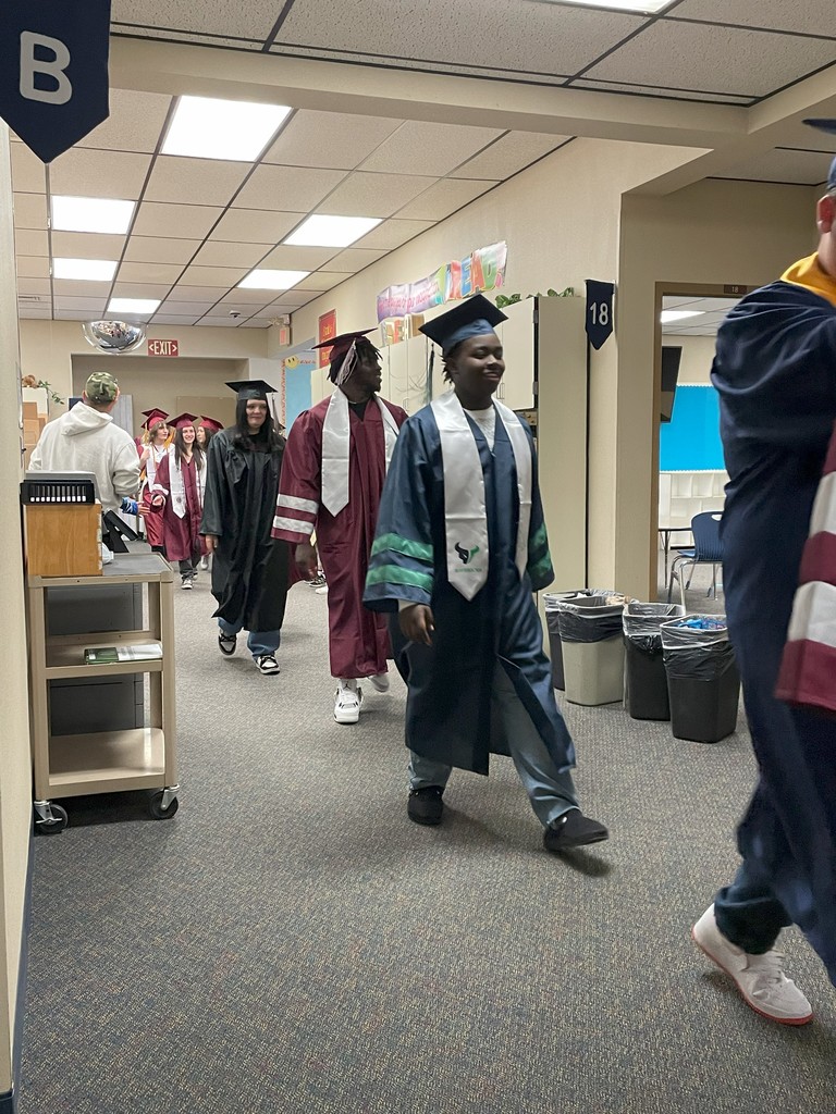 Grads walking the hallway