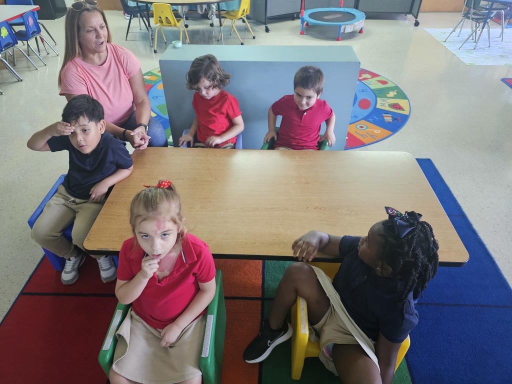 Mrs. Leigh's class getting in the swing of the new school year in circle time, story time, and learning labs.