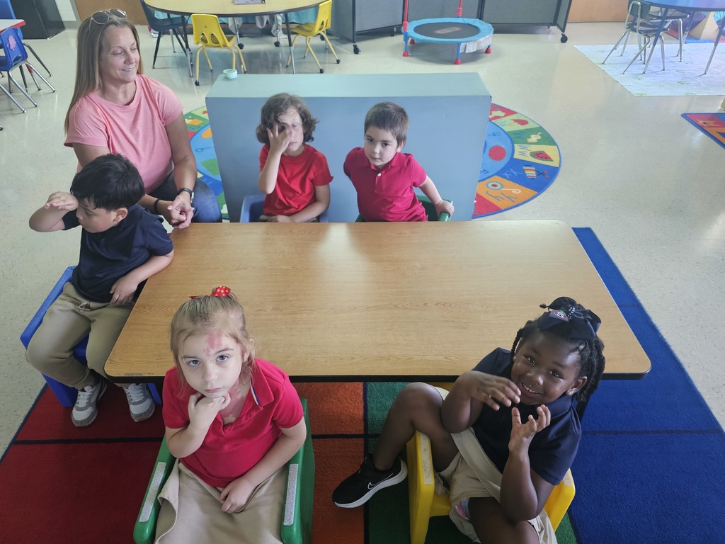 Mrs. Leigh's class getting in the swing of the new school year in circle time, story time, and learning labs.