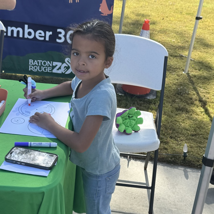  Port Allen Elementary Girl Scouts enjoying an event at BR Zoo. They learned about animals and how to take care of our planet. 