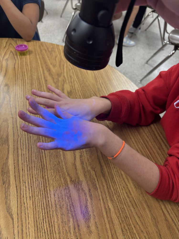 They were able to see germs on their hands using a black light.