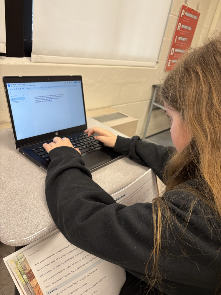 ELA class working hard on their essays! 📝