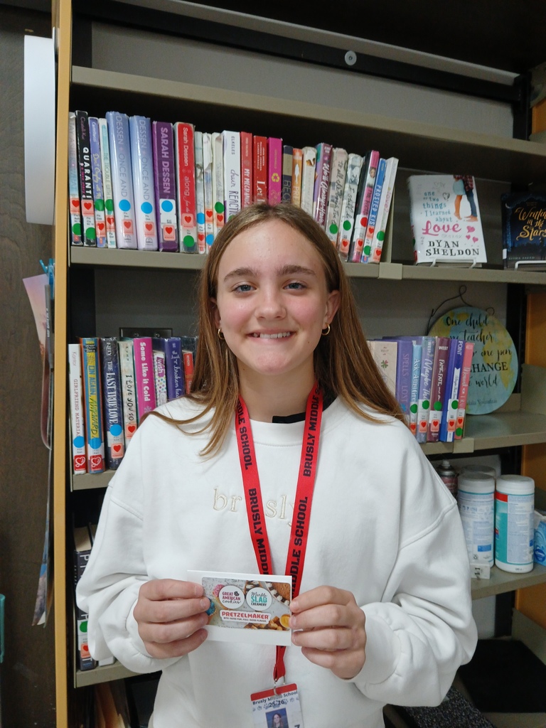 student holding gift card