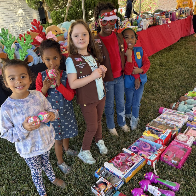 PAES Girl Scouts helping today with The Anderson's Toy Give Away! 🧸 