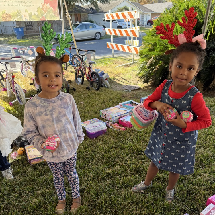 PAES Girl Scouts helping today with The Anderson's Toy Give Away! 🧸 