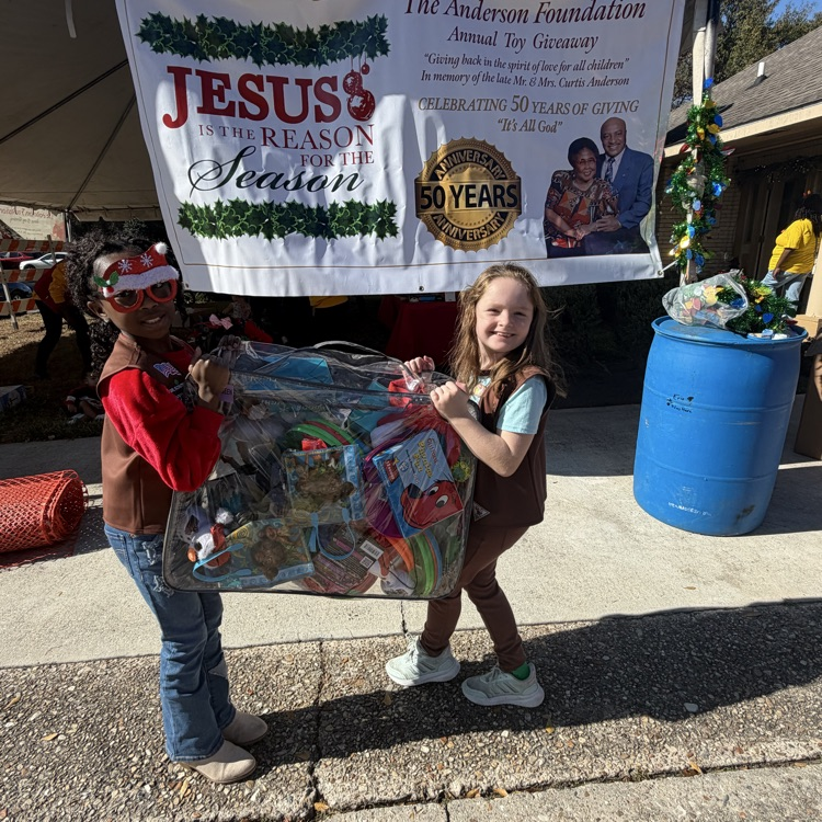 PAES Girl Scouts helping today with The Anderson's Toy Give Away! 🧸 