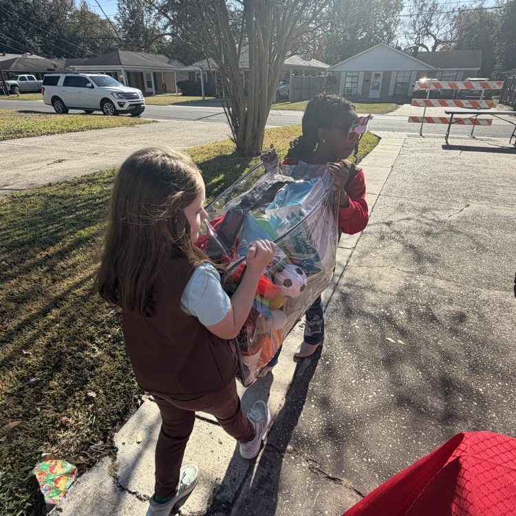 PAES Girl Scouts helping today with The Anderson's Toy Give Away! 🧸 