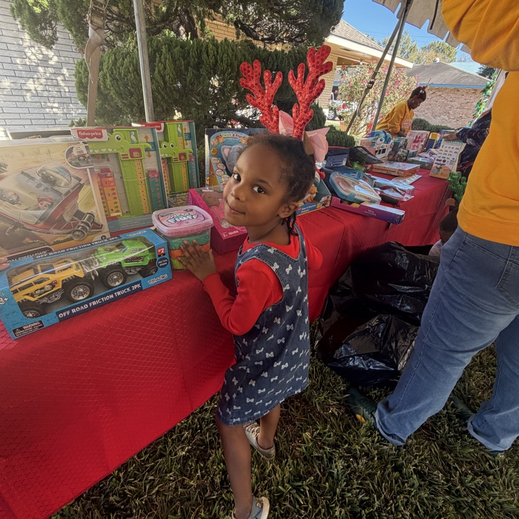 PAES Girl Scouts helping today with The Anderson's Toy Give Away! 🧸 